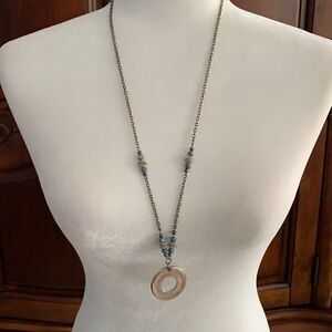 Silver disk pendant necklace
